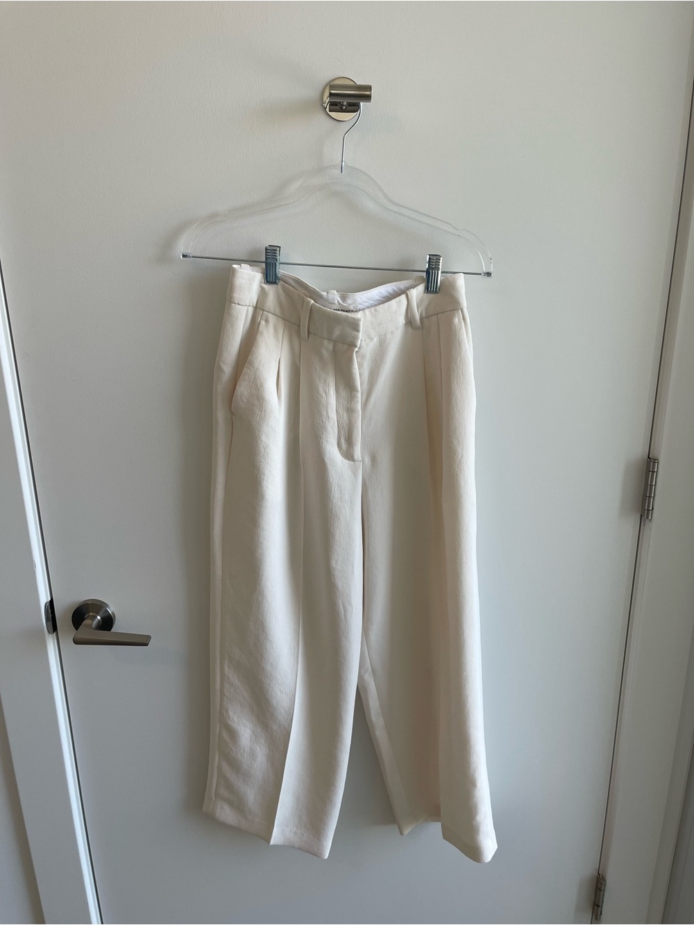 Aritzia The Effortless Cream Wide-Leg Pleated Trousers
